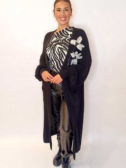 Cardigan con fiori a stelo